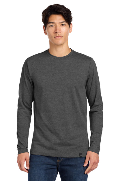 Front View of Black Heather New Era Heritage Blend Long Sleeve Crew Tee. NEA102 plain