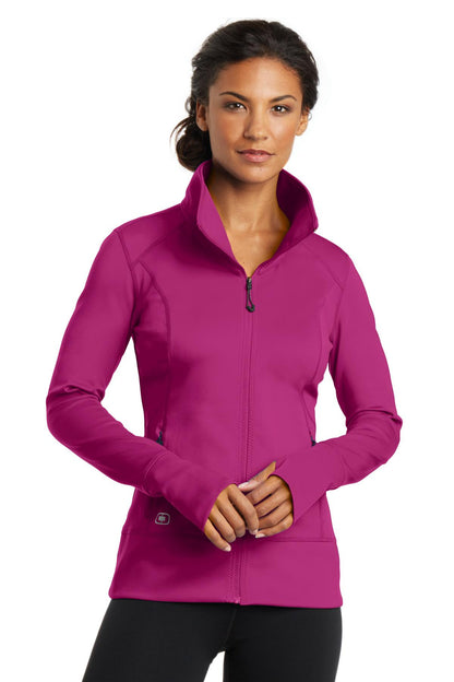 Front View of Flush Pink OGIO Women's Fulcrum Full-Zip. LOE700 plain