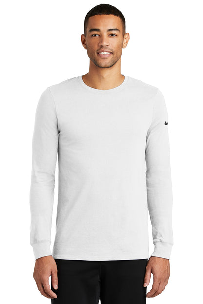 Front View of White Nike Dri-FIT Cotton/Poly Long Sleeve Tee. NKBQ5230 plain